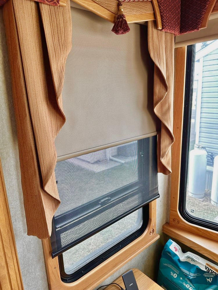 Interior RV shot of newly installed day and night roller shades.